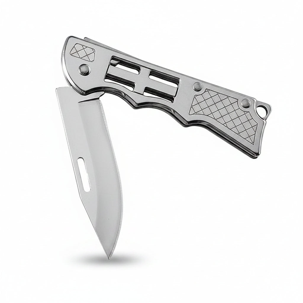 Folding knife with a metallic handle and blade on a white background