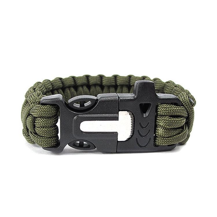 Green paracord bracelet with a black metal clasp on a white background