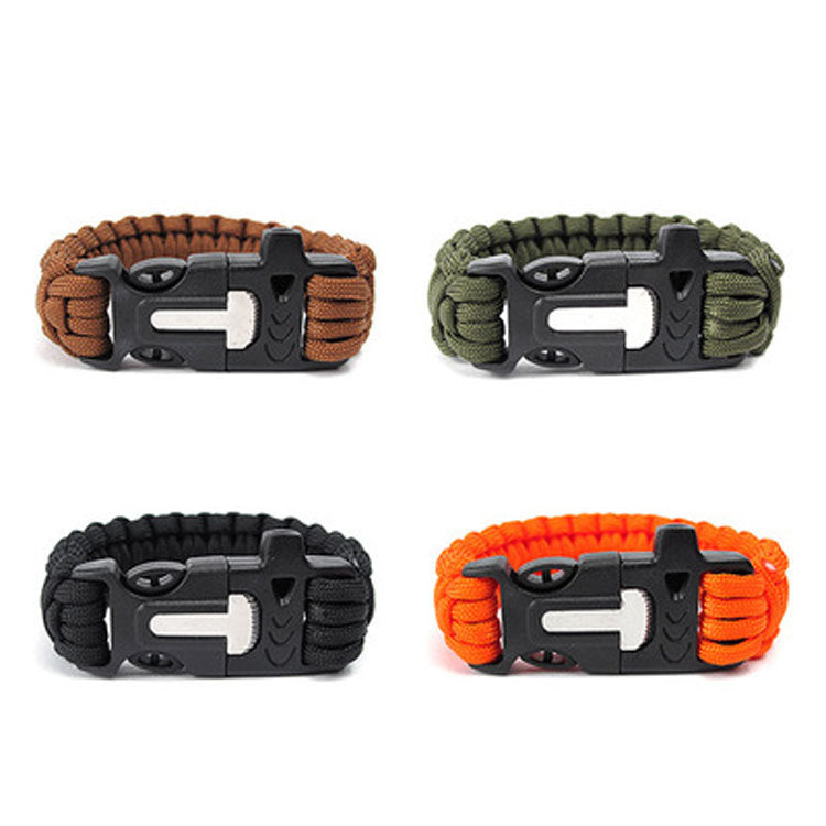 Four paracord bracelets with metal clasps in brown, green, black, and orange on a white background.